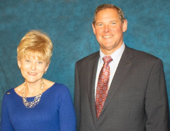 Audrey Bresset taking picture with HNB President David Raven  for 45 years of service.